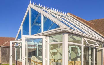 conservatory roof insulation costs Merton Park